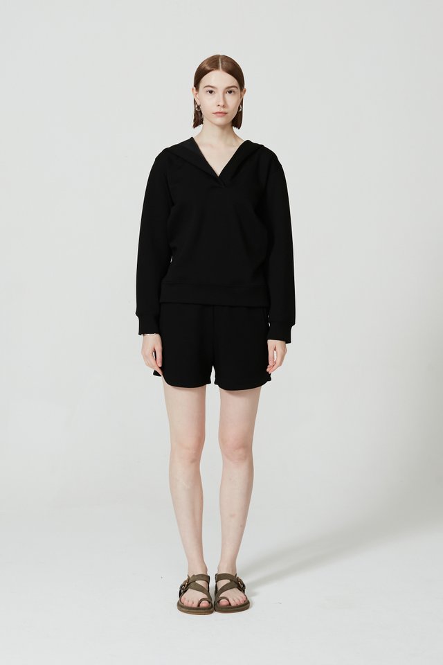 CURVED HEM SHORTS