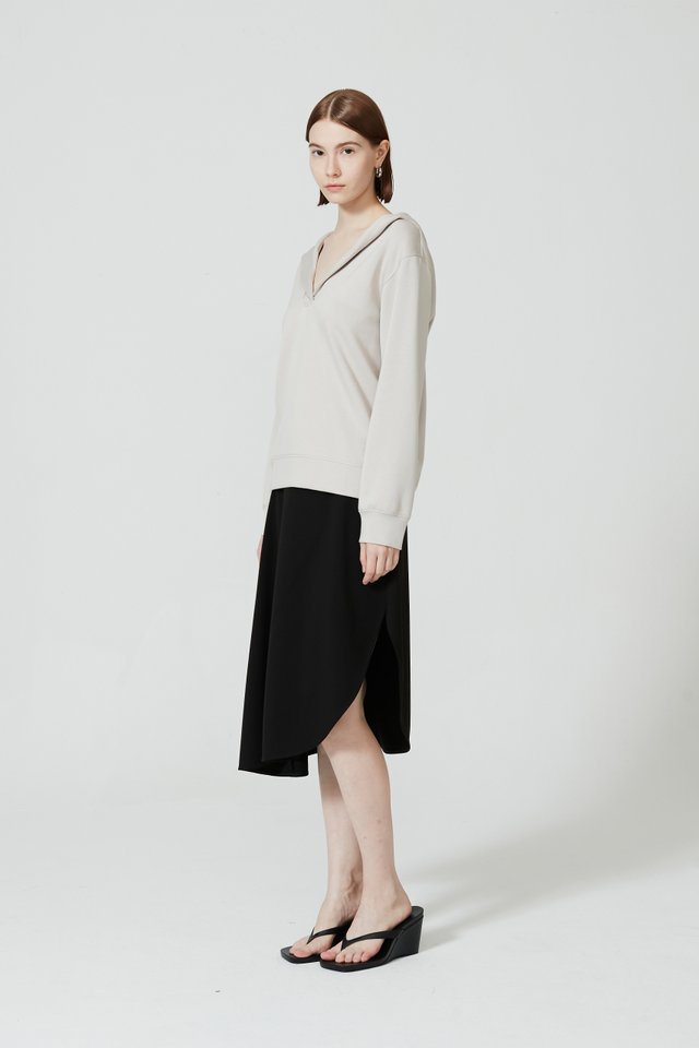 ASYMMETRIC HEM SKIRT